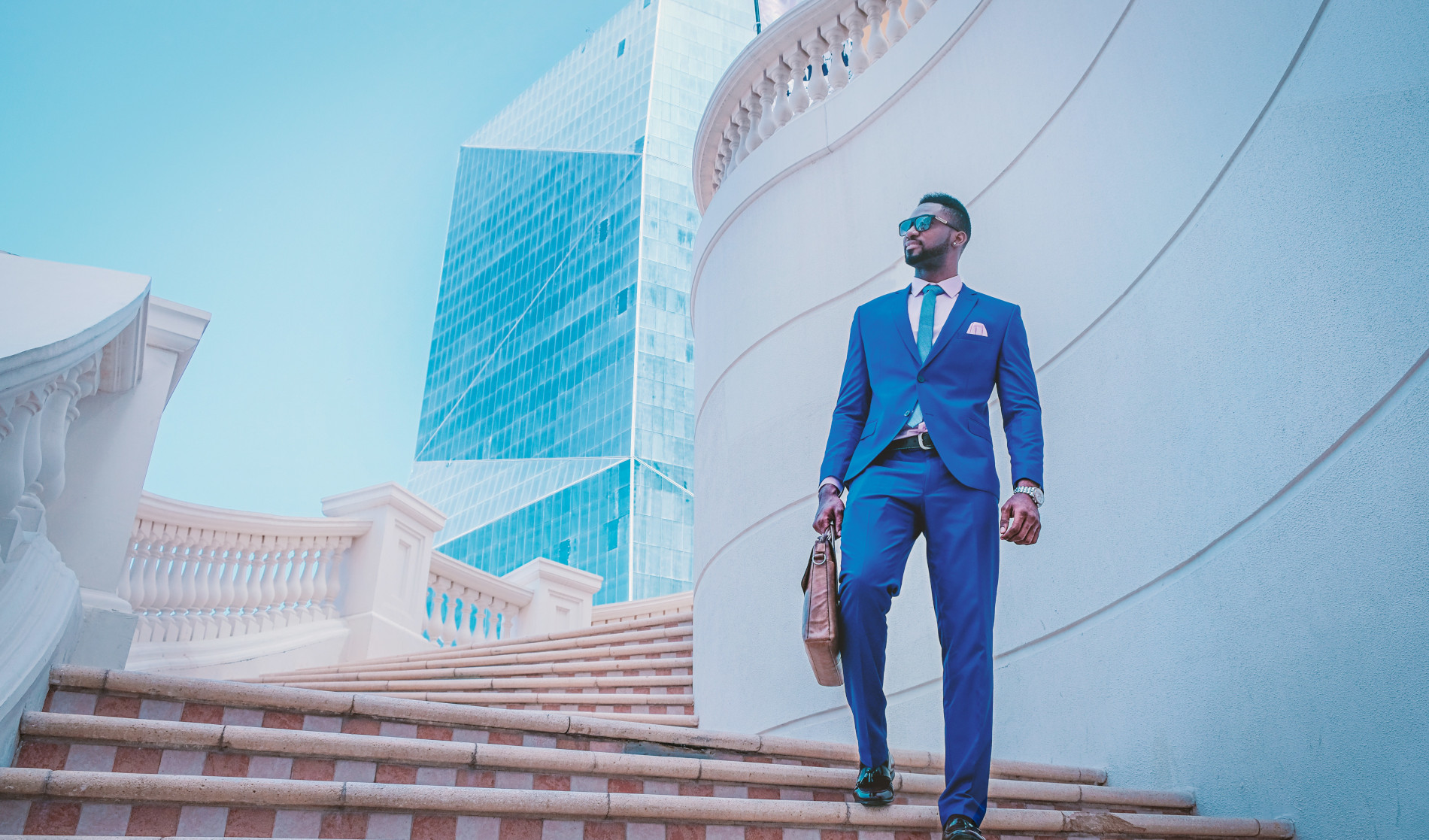 Image of man in blue suit.